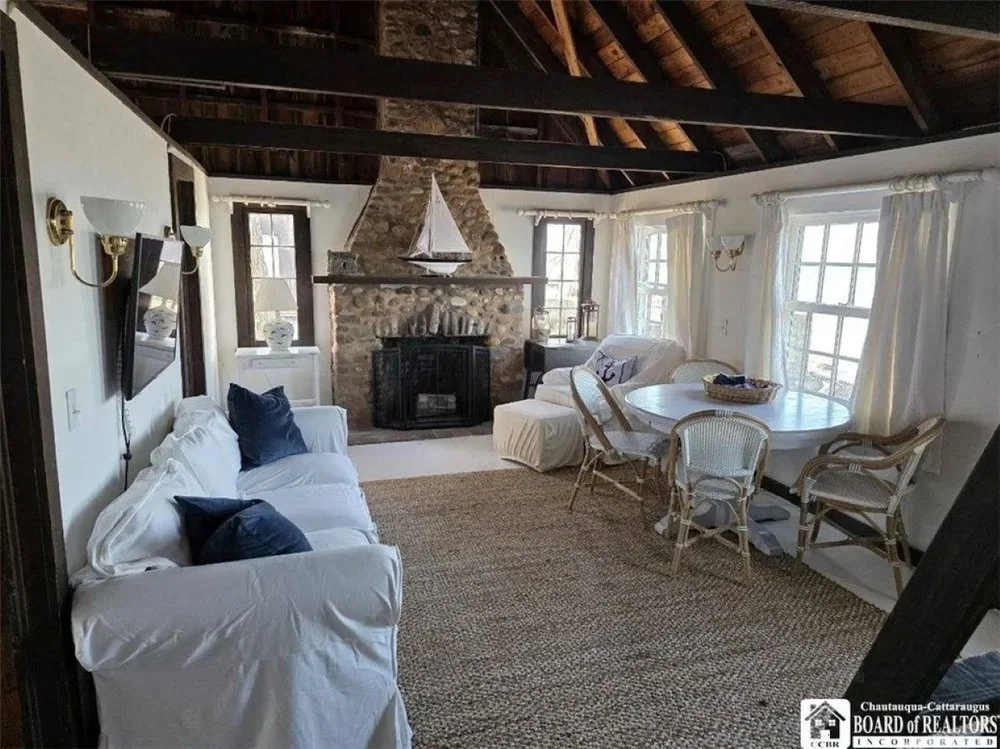 Living room of Fisher Price Toy co-creator's original cottage in Fredonia, NY, on sale for $399,000