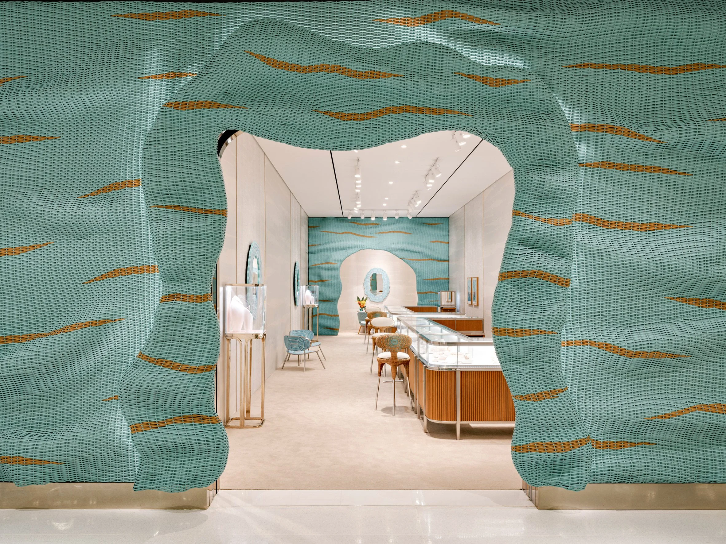 A woven wicker facade folds over around the entrance to the Tiffany & Co pop-up