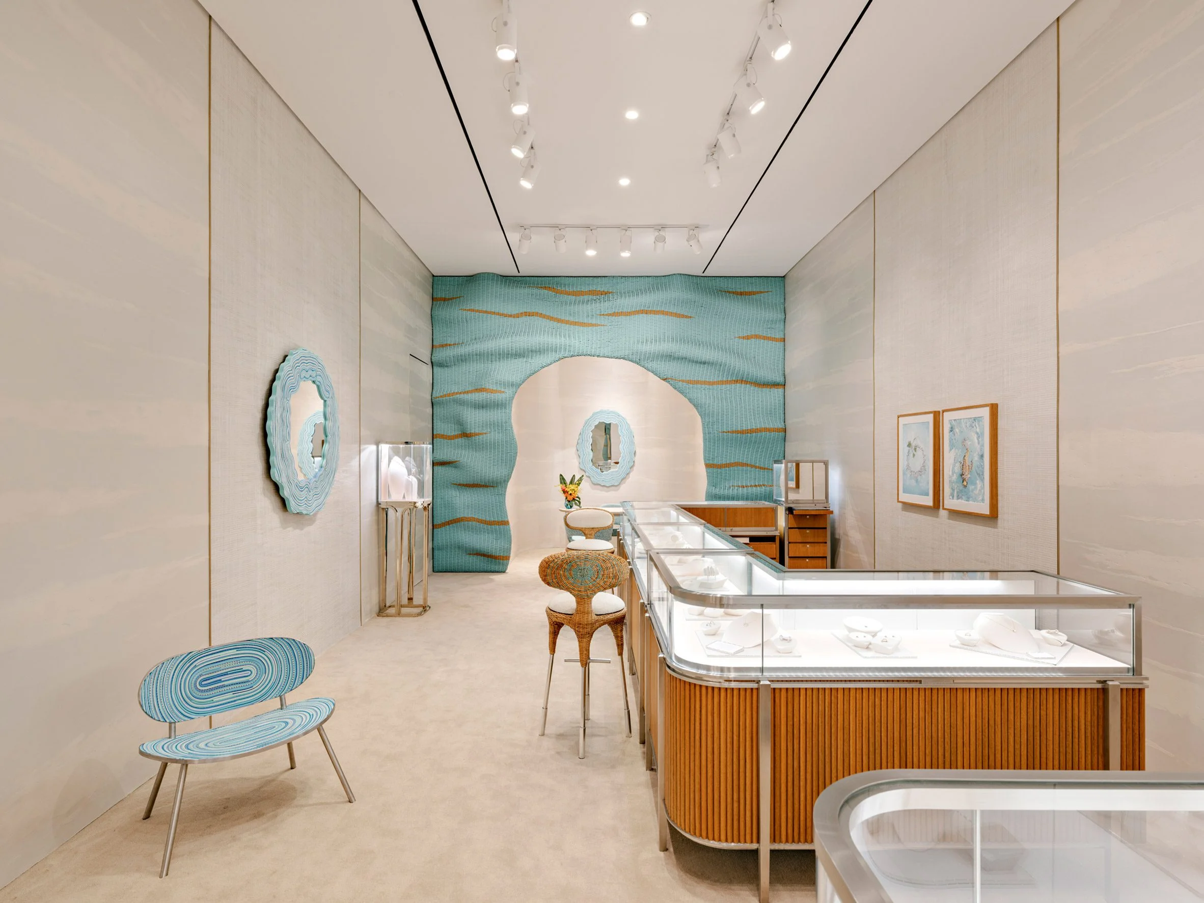 A store interior with blue hues applied to chairs and mirror frames